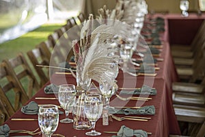 Elegant long table set up for an outdoor wedding reception
