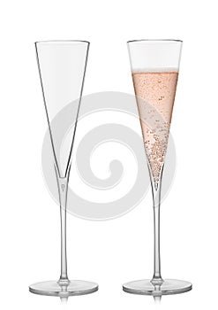 Elegant luxury glass with pink rose champagne with bubbles on white. Fine empty and full glass for fine dinner