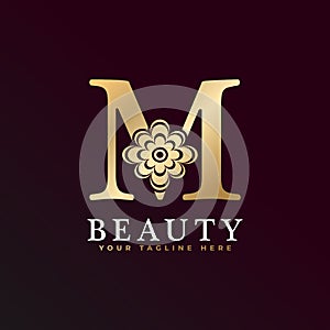 Elegant M Luxury Logo. Golden Floral Alphabet Logo with Flowers Leaves. Perfect for Fashion, Jewelry, Beauty Salon, Cosmetics, Spa