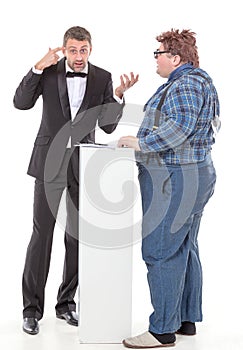 Elegant man arguing with a country yokel