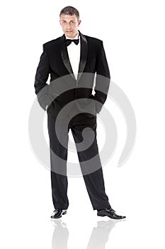 The elegant man in a classical tuxedo