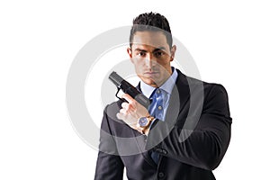 Elegant man with gun, dressed as a spy or secret agent