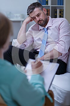 Elegant man on psychotherapy session