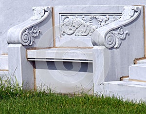 Elegant Marble Bench with Scrollwork photo