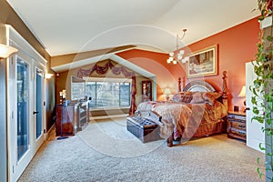 Elegant Master suite with red and grey walls