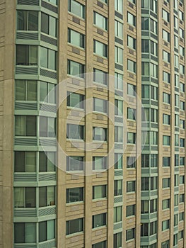 Elegant, modern green and brown facade building on Manhattan