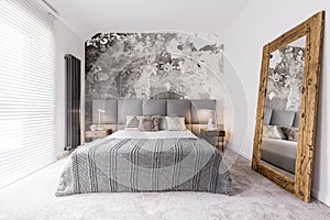 Elegant, monochromatic bedroom photo