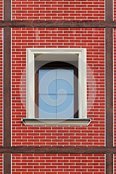 Elegant new window in red brick wall