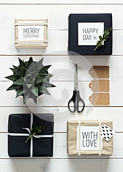 Elegant nordic retro christmas, wrapping station, desk view from above, xmas concept