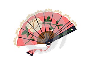 Elegant open hand fan of 18th and 19th century. Air cooling accessory with lace, tassel, flower pattern in classic photo