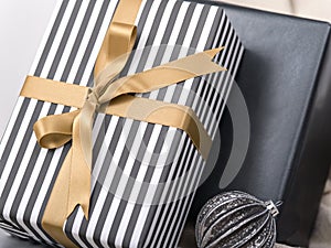 Elegant package of present box with bow.