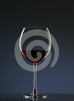 Elegant photo of a glass of red wine