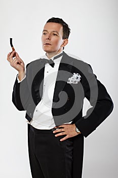 Elegant pipe smoker on white background.