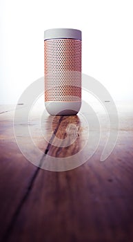 Elegant portable bluetooth speaker isolated on wooden background