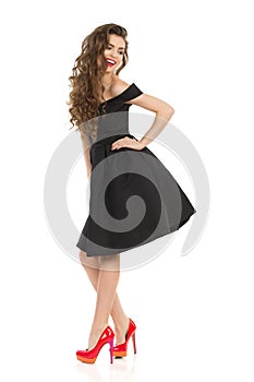 Elegant Positive Woman In Black Cocktail Dress