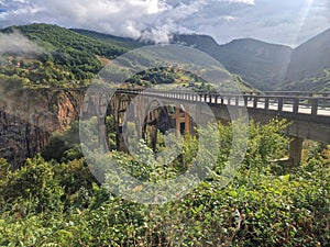 The elegant reinforced concrete arched Djurdjevic Bridge over the Tara River canyon