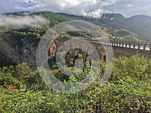 The elegant reinforced concrete arched Djurdjevic Bridge over the Tara River canyon