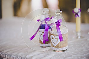 Elegant sand bottles at wedding