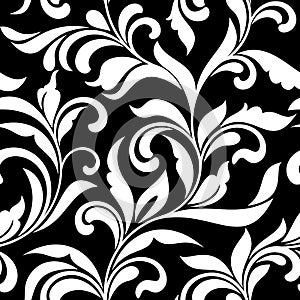 Elegant seamless pattern. Tracery of swirls and decorative leaves on a black background. Vintage style. photo