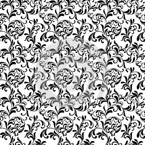 Elegant seamless pattern. Tracery of swirls and leaves on a whi