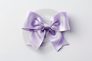 Elegant silk gift bow isolated on white background, perfect for gifting and celebrations