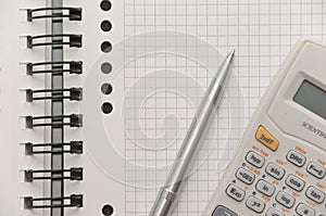 Elegant silver pen and scientific calculator