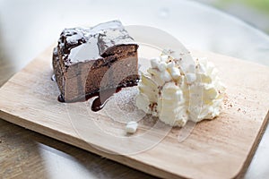 Elegant still life of chocolate frosted brownie