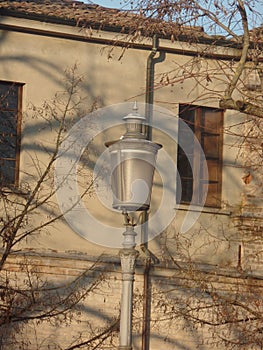 Elegant street lamp in an Italian town