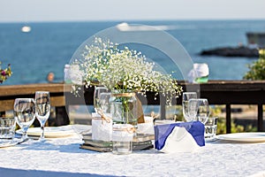 Elegant summer wedding table in front of the beach