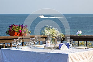 Elegant summer wedding table in front of the beach