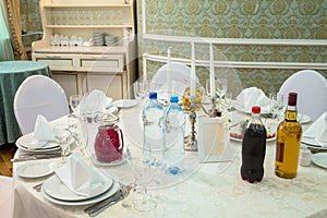 Elegant table with bottles in a restaurant