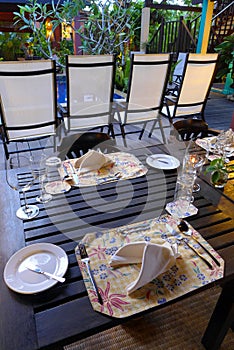 Elegant table cutlery setting, outdoor garden
