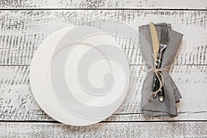 Elegant table place setting on white wooden table. Top view