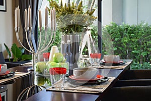 Elegant table set in modern style dining room