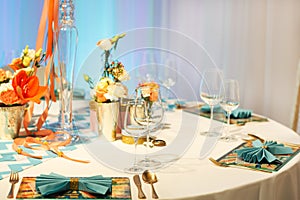 Elegant table set in soft creme for wedding or event party.