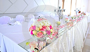 Elegant table setting for bride and groom wedding theme