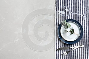 Elegant table setting on grey marble table, flat . Space for text