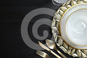 Elegant table setting and space for text on dark background