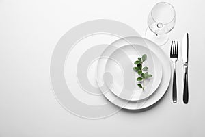 Elegant table setting on white background