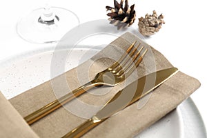 Elegant table setting on white background, closeup