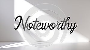 Elegant typography of the word Noteworthy cast in soft shadows on a light wall photo
