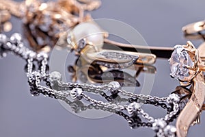 Elegant unusual silver chain and gold jewerly