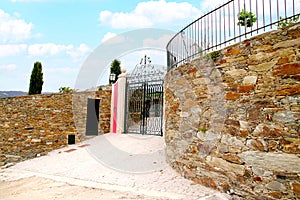 Elegant villa entrance with iron gate