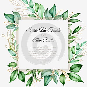 Elegant wedding card with beautiful floral and leaves template photo