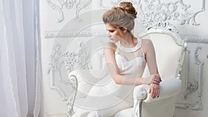 Elegant wedding dress, straight silhouette. Portrait of a young beautiful bride