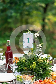 Elegant wedding table arrangement, floral decoration, restaurant. Wedding table setup