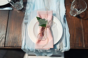 Elegant wedding table arrangement, floral decoration, restaurant. Wedding table setup.