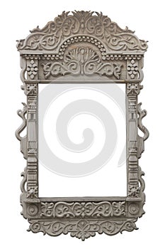 Elegant windows of a wooden house, beautiful carved platbands of handmade windows.