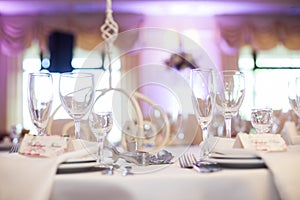 Elegant wine & champagne glasses at wedding reception closeup