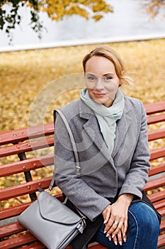 Elegant woman in autumn park